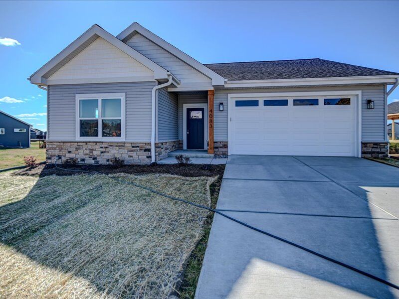 Front of 4083 Eagle Mound Pass with stone accents