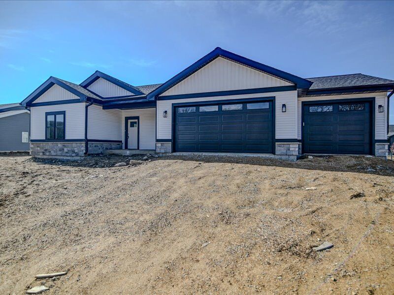 Front of 6647 Royal View Drive with dark trim and stone