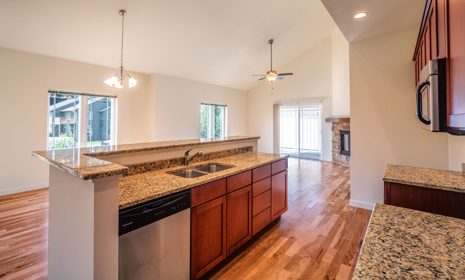 Kitchen and dining area with vaulted ceiling
