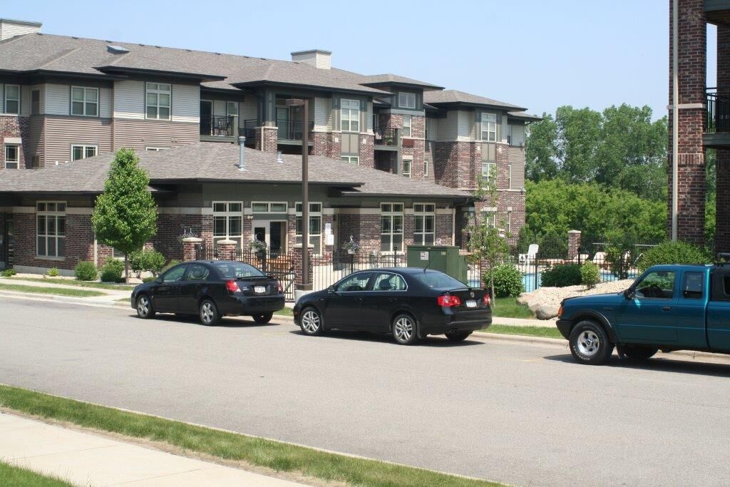 Three-story apartment building with balconies